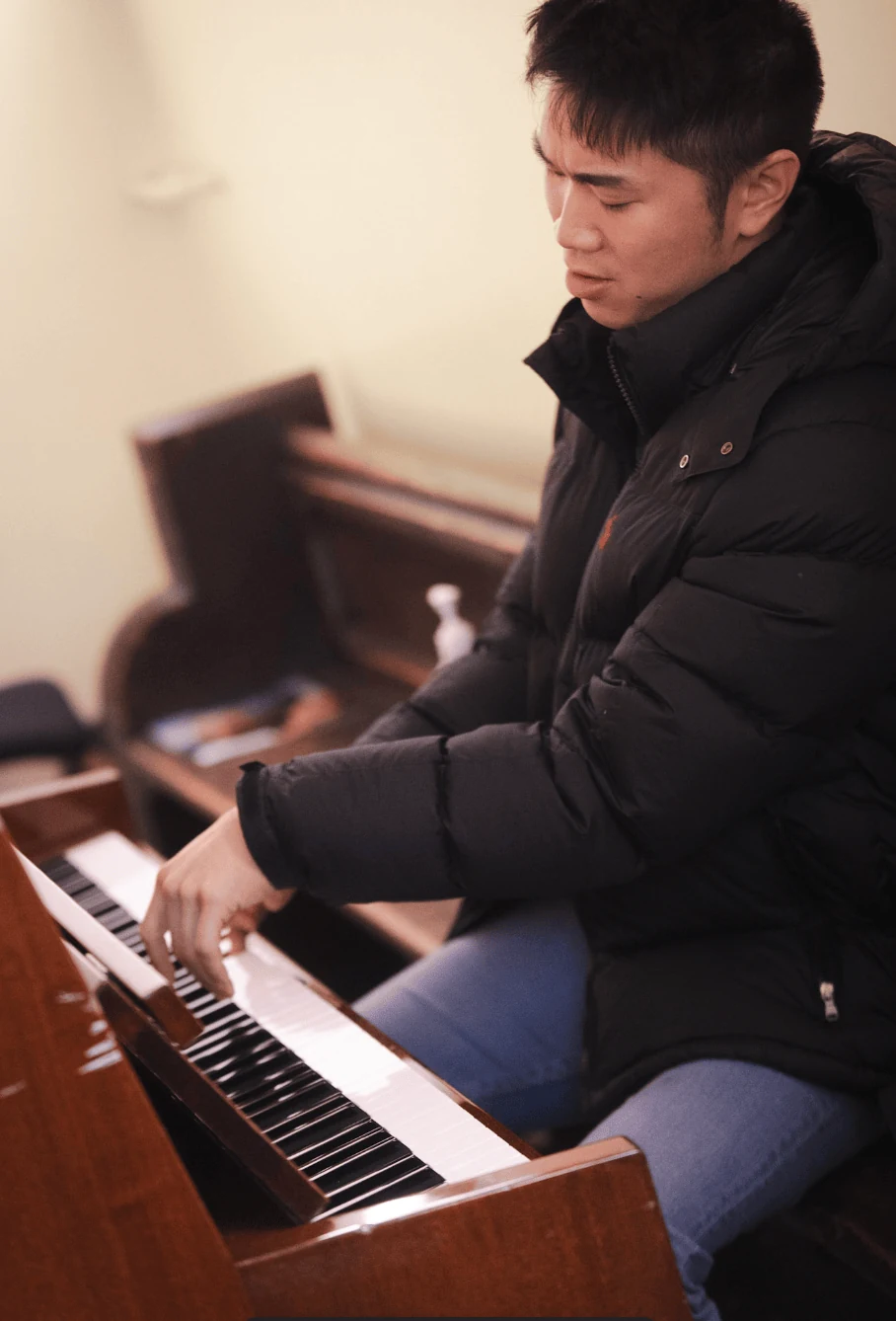 A student plays piano at Lee Strasberg Theatre & Film Institute